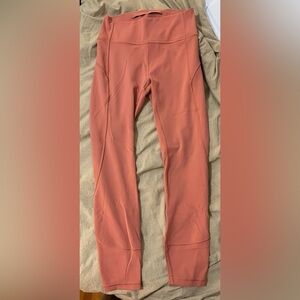 Lululemon size 6 peach compression leggings.